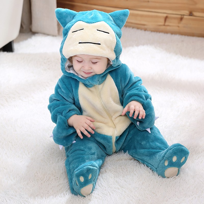Bébé assis en combinaison Ronflex bleu-vert avec pieds à griffes